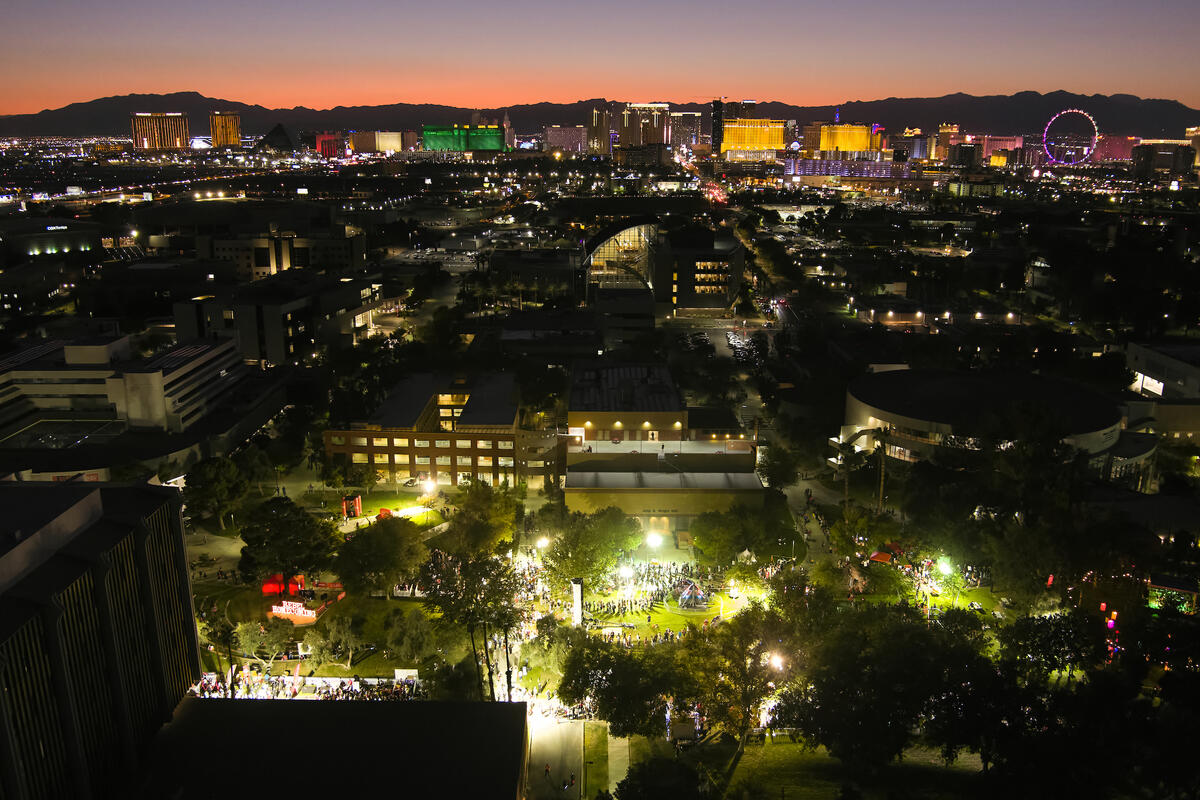 An aerial image of a Homecoming Festival with the Las Vegas strip in the background.