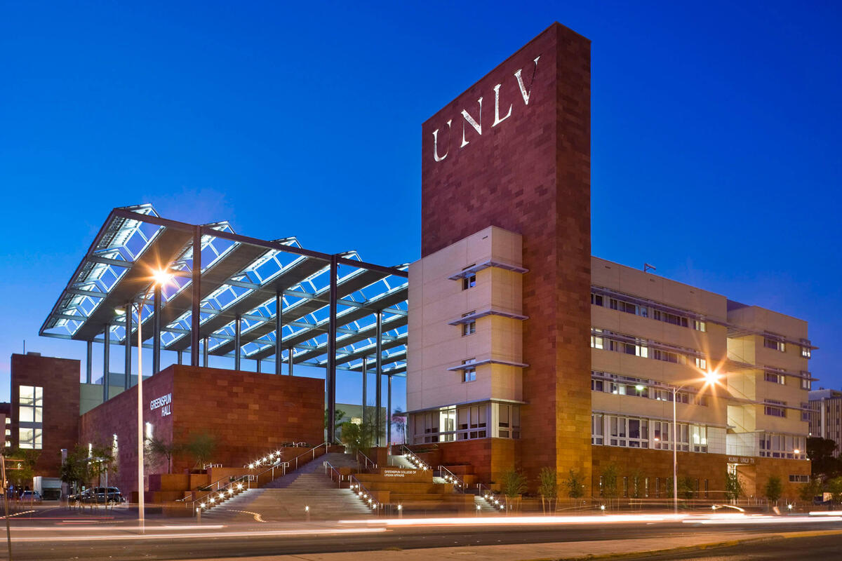 outside shot of Greenspun Hall at night