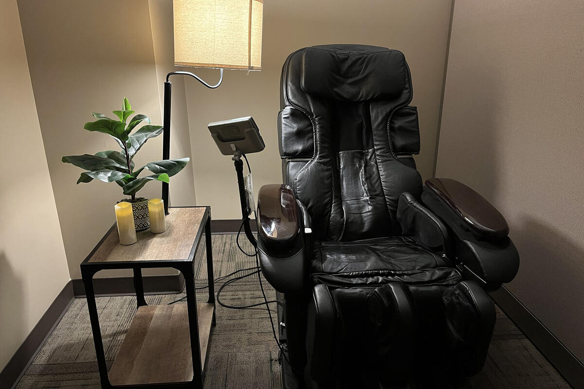 Picture of a leather recliner in an office corner