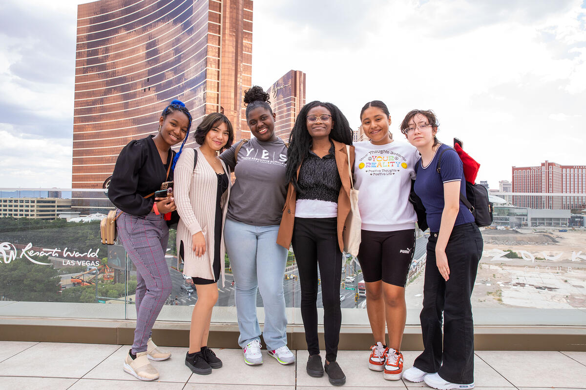 women posing in front of the Wynn casino