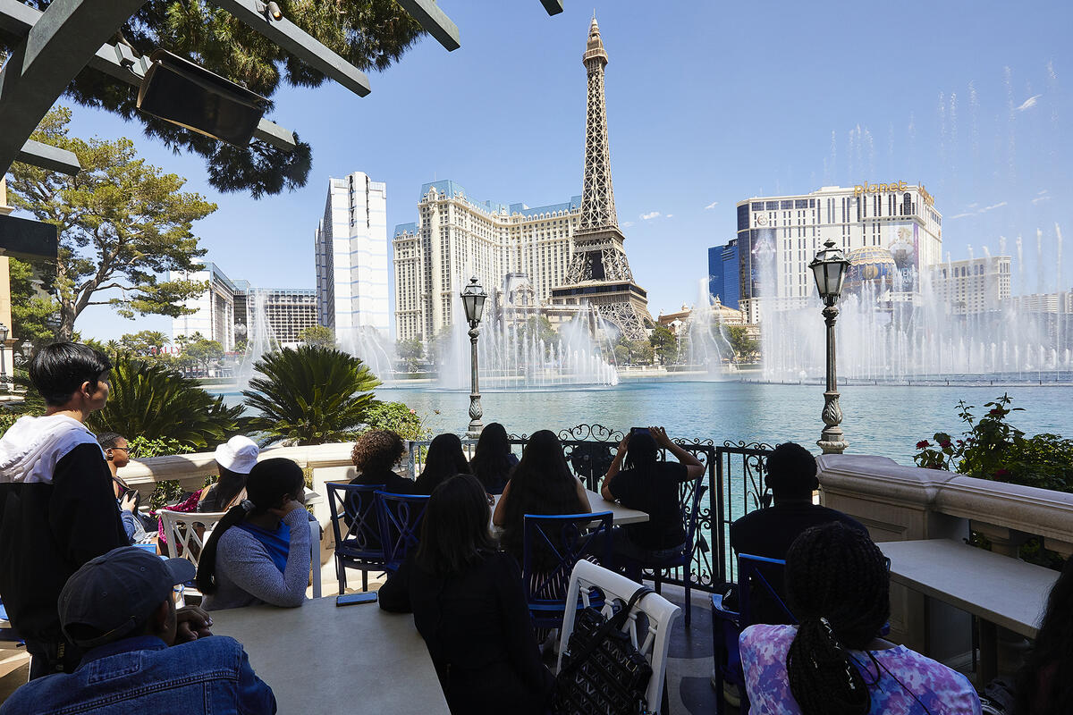 People seated outside Bellagio fountain show