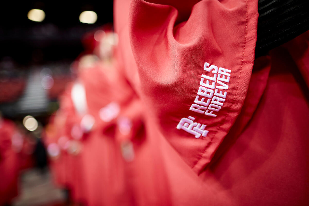 Close up of the &quot;Rebels Forever&quot; logo on UNLV undergraduate gown.