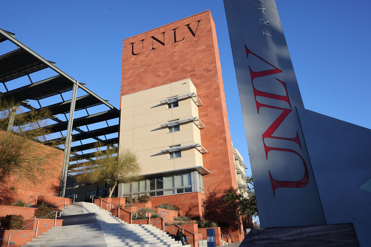 Greenspun Hall with the U-N-L-V Transit in front