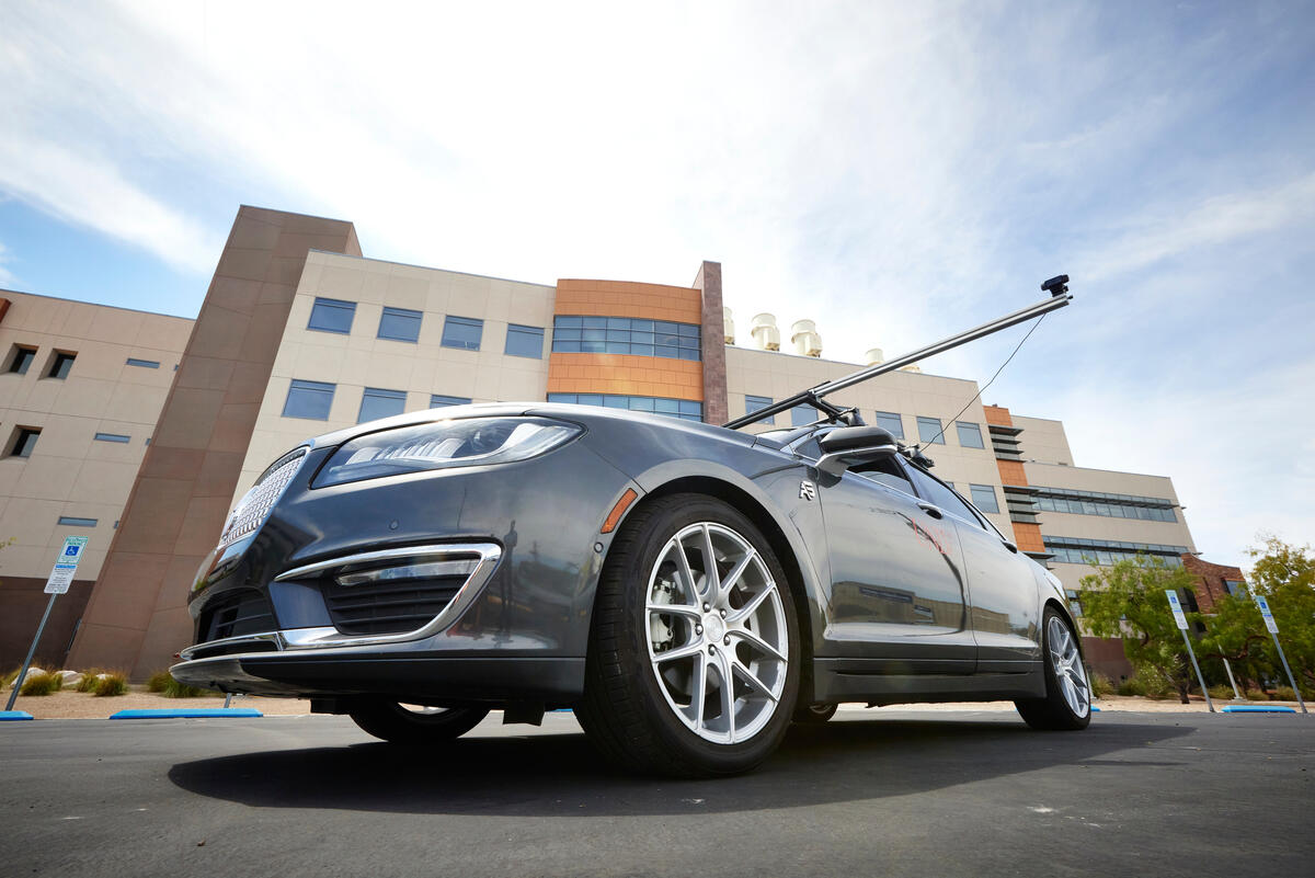 Gray sedan parked in front of the UNLV Science and Engineering Building