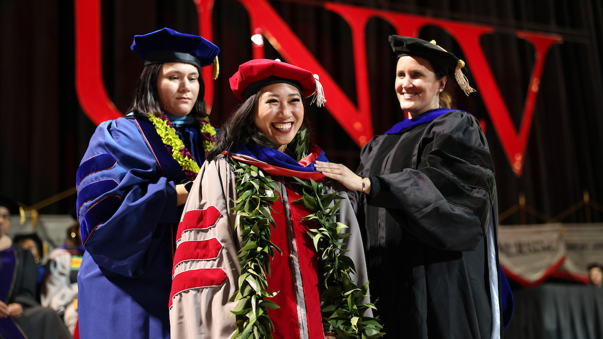 Espinoza at a graduation ceremony