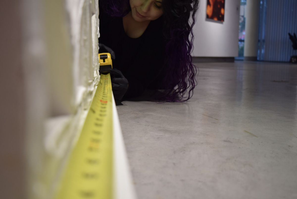 student with tape measure 
