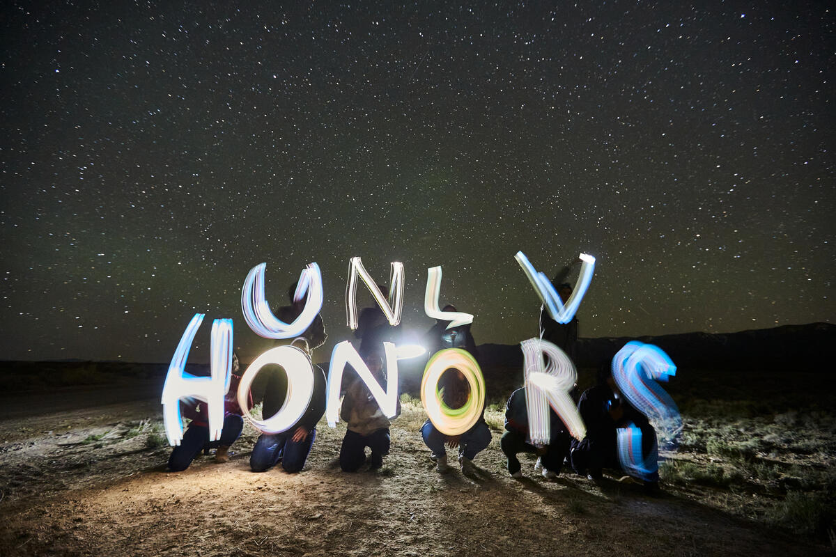 Light effects that spell 'UNLV HONORS' at night