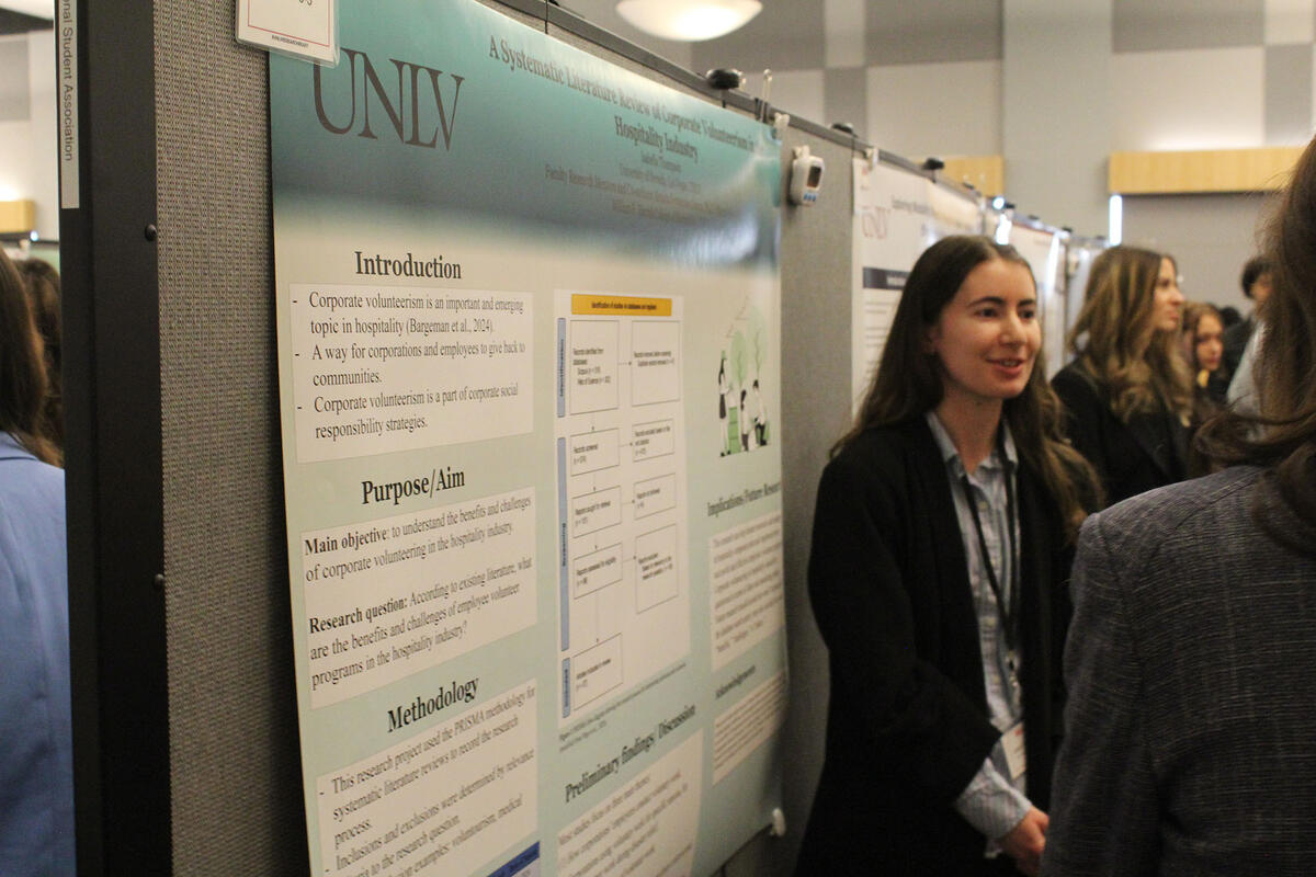 Person standing in front of project