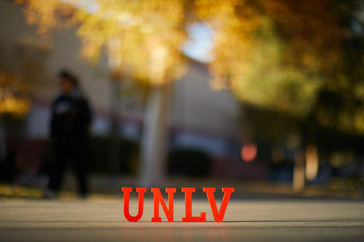 UNLV letters on the sidewalk of CHB building.