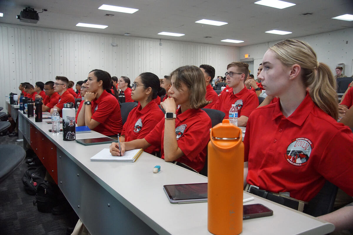 A classroom full of people with matching red AFROTC polos. 