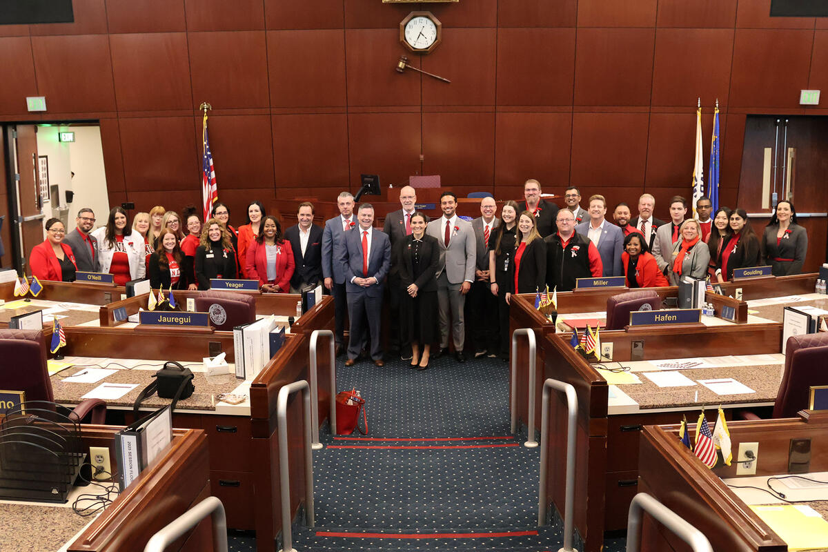 A group of people standing in a court room