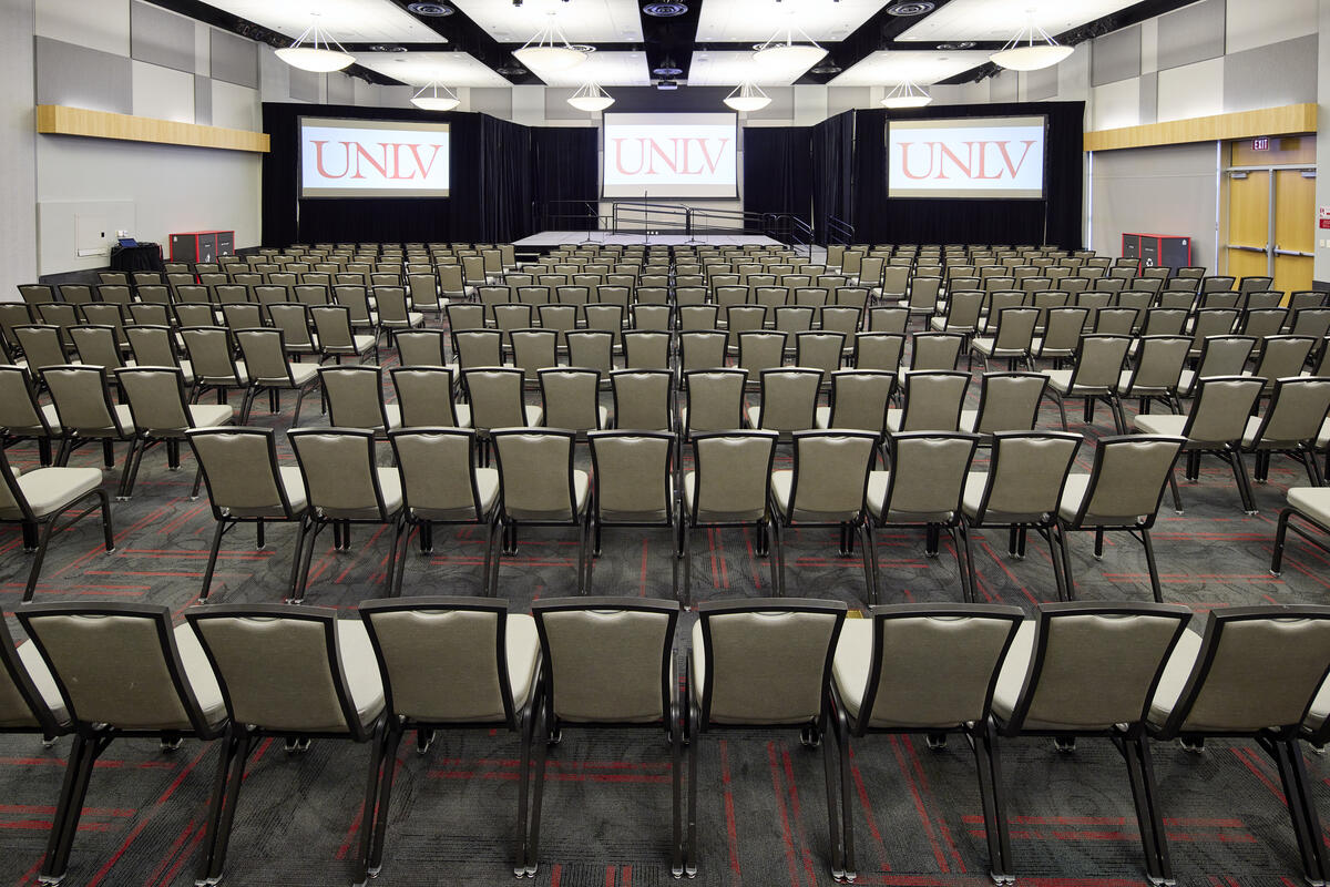 a large conference room with theatre seats