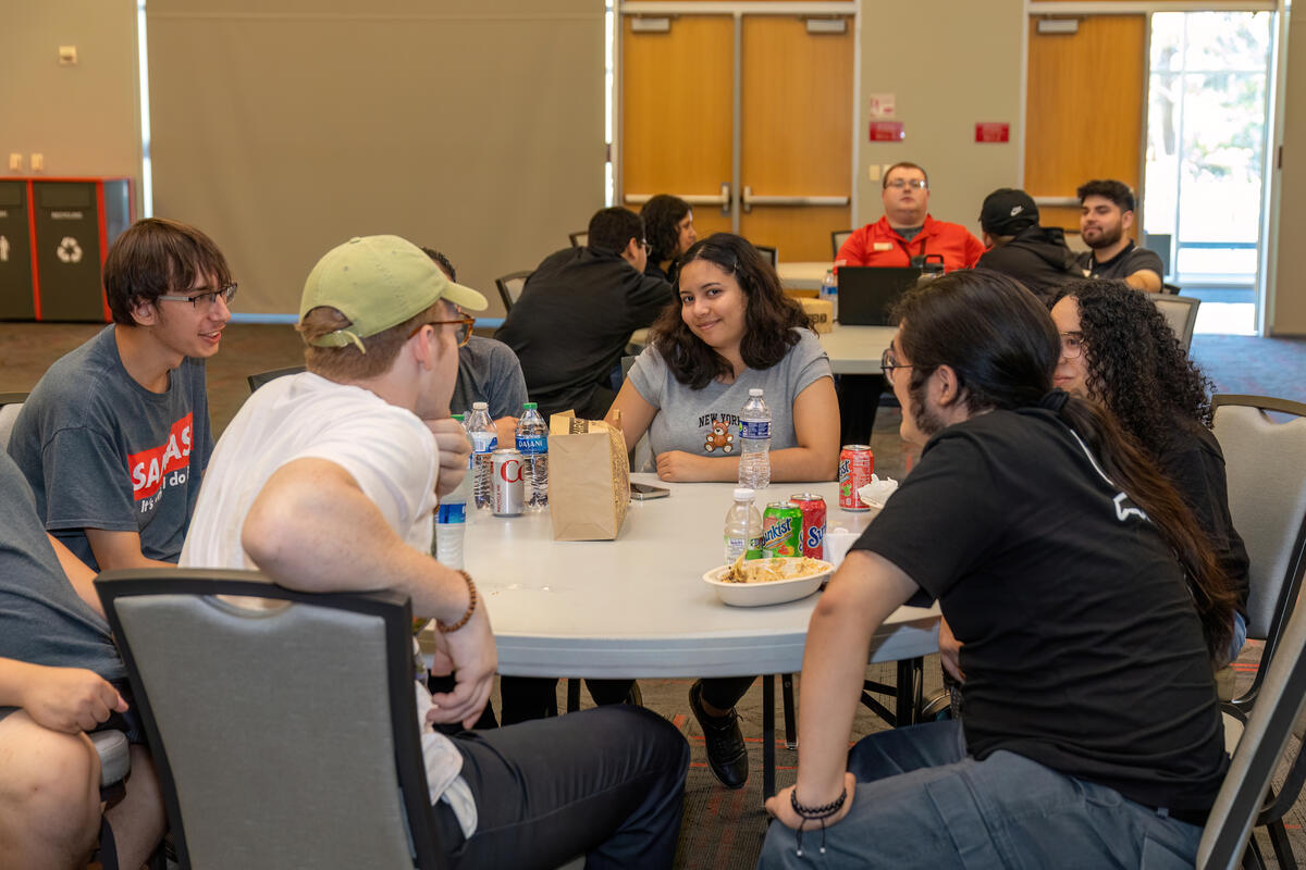 students sitting together in a round table