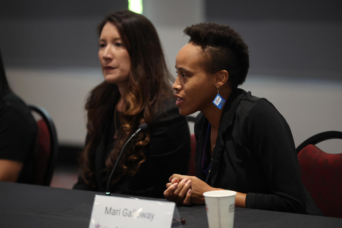 A photo of two people sitting 