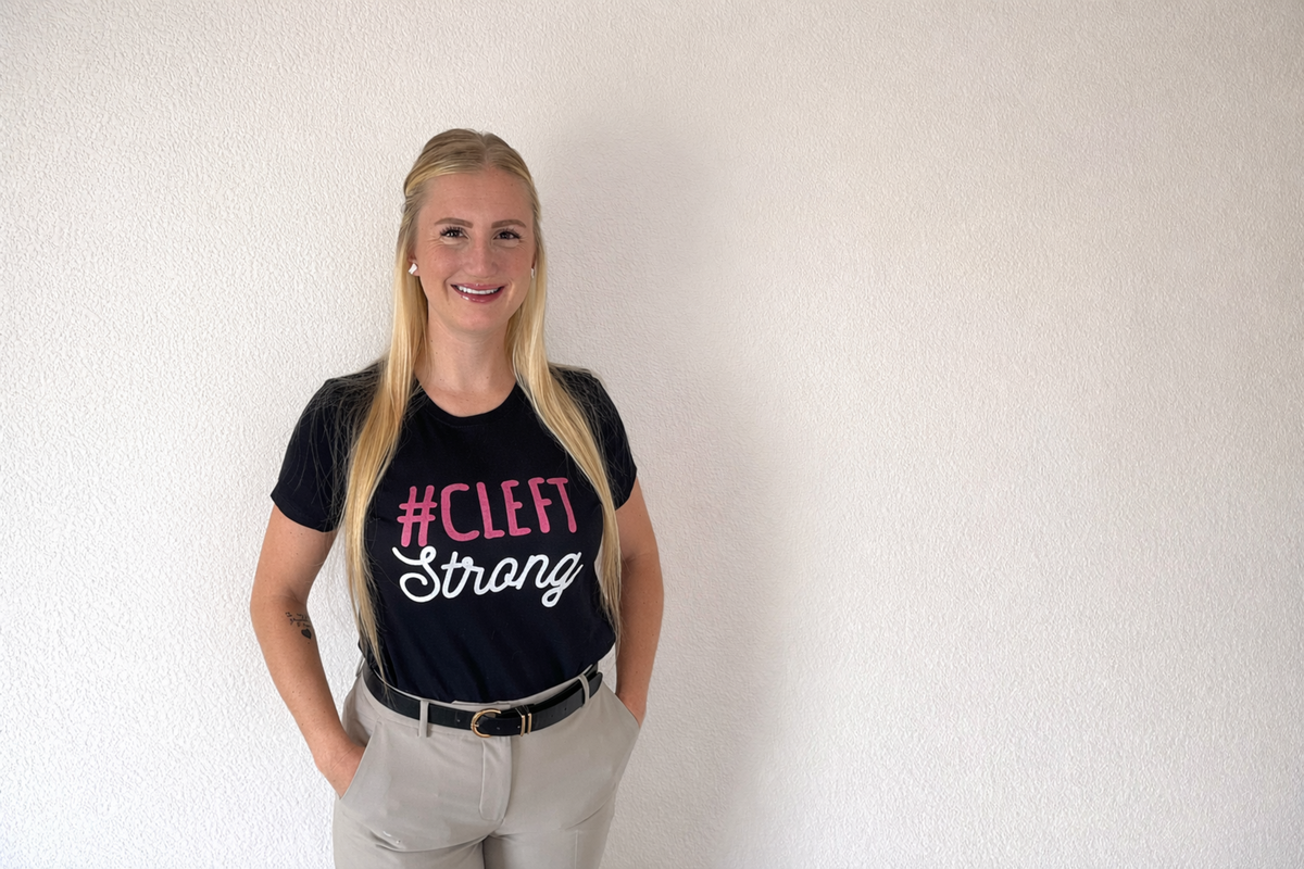 Chelsey Nicol wearing a shirt that reads "#Cleft Strong"