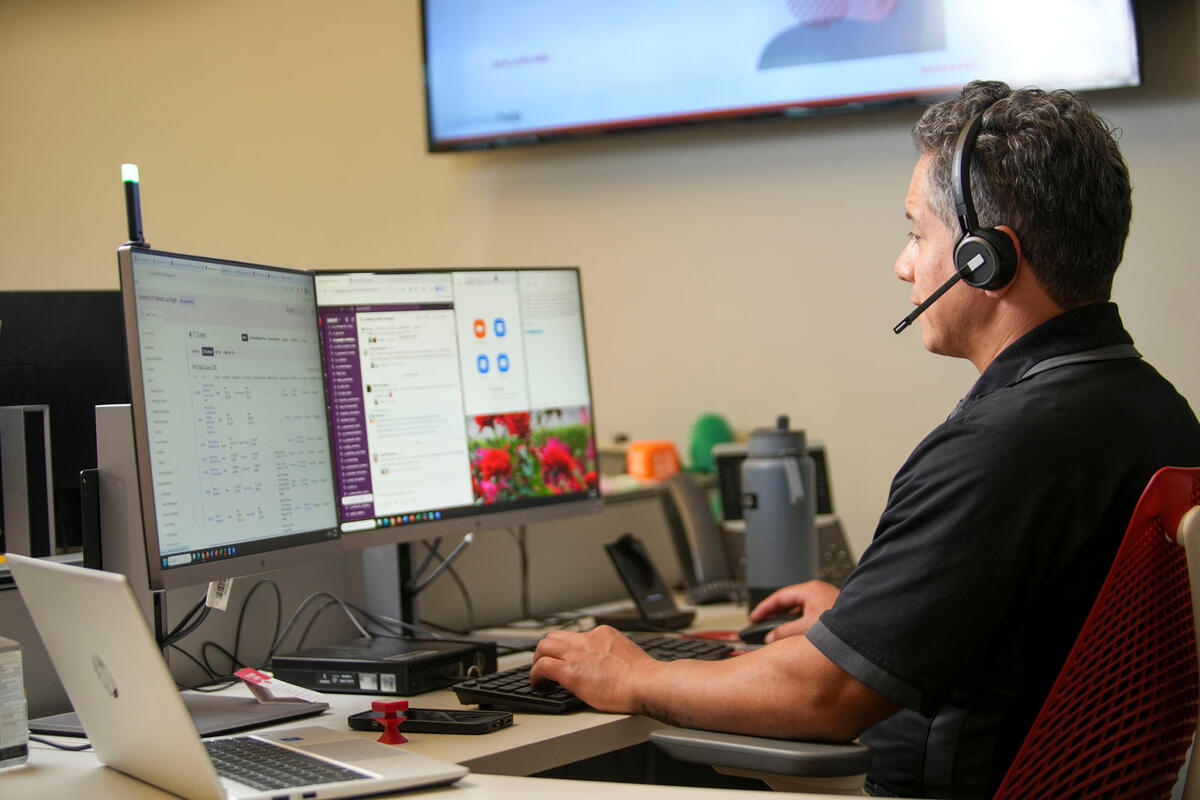 A person in front of an computer