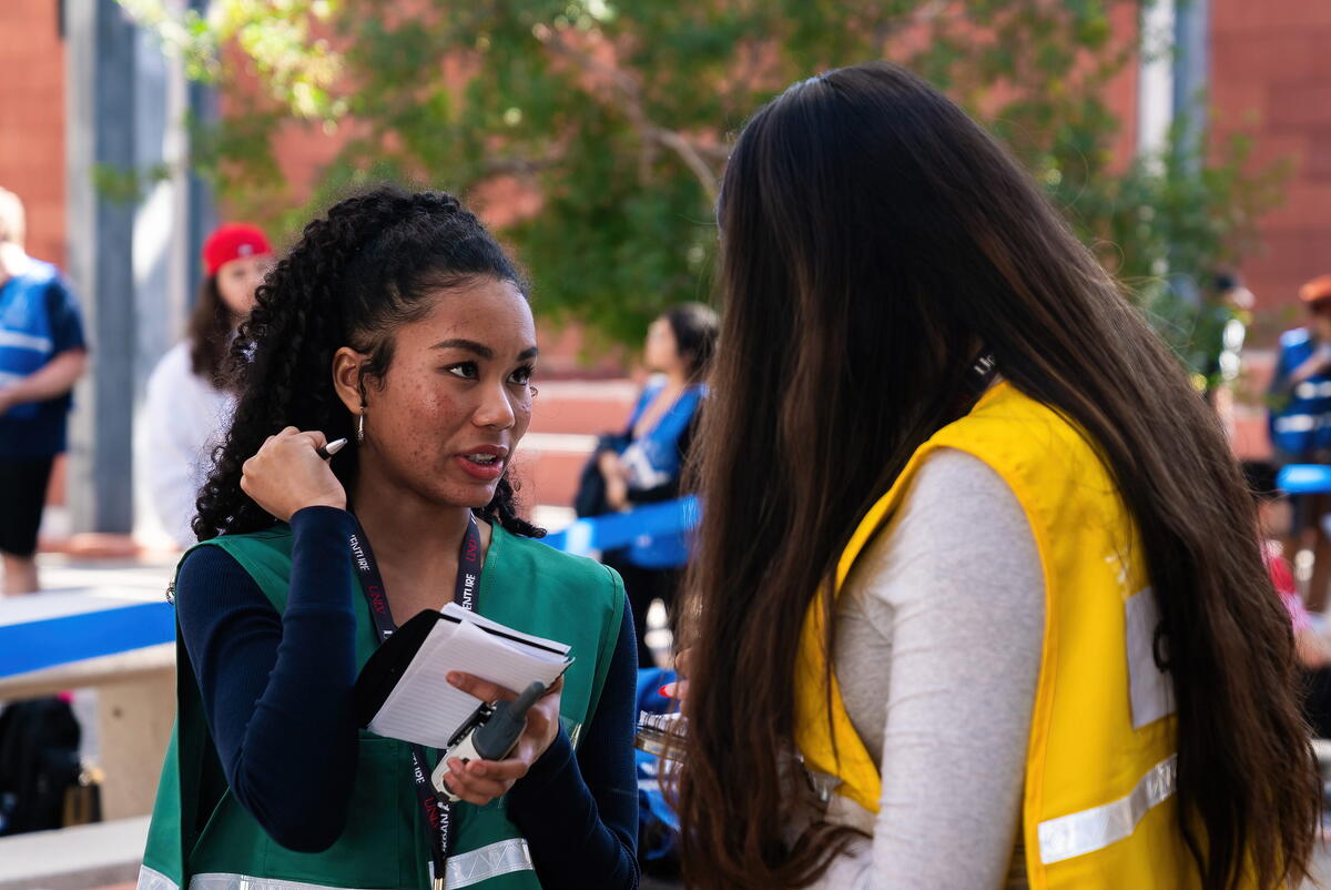 Students working with people