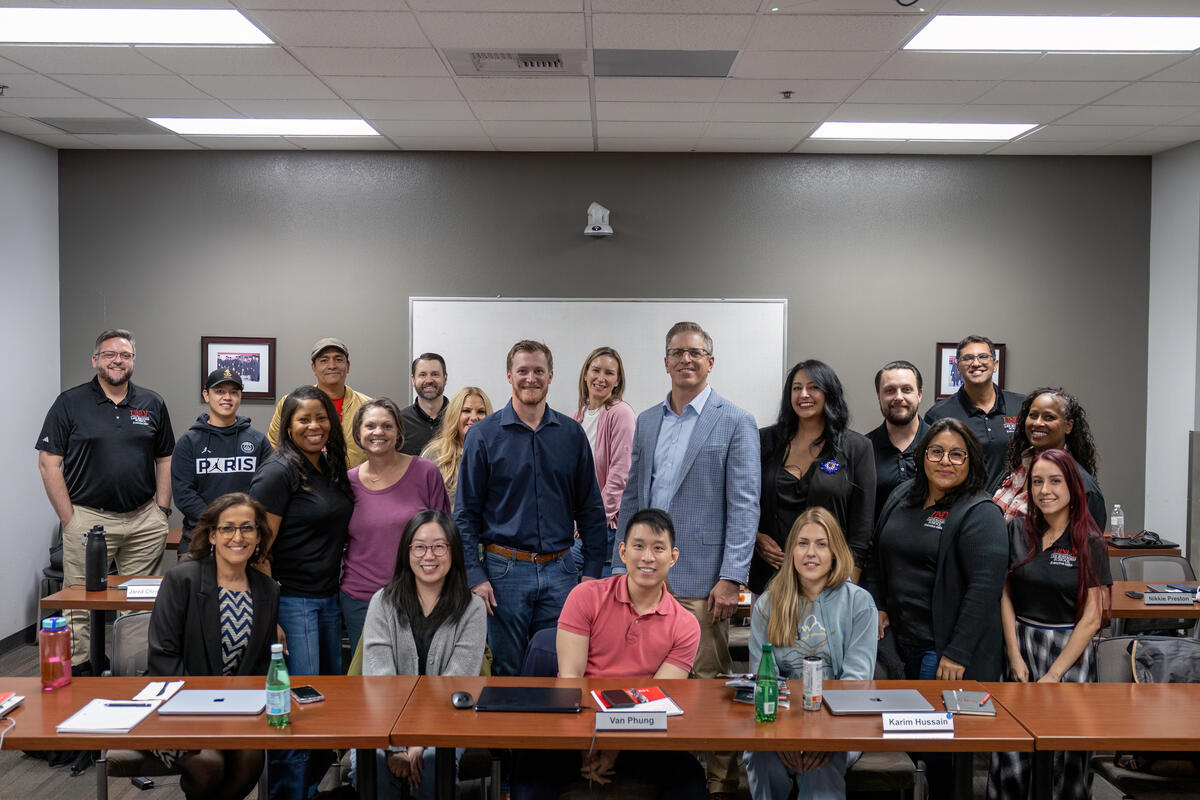 image of people standing by the wall
