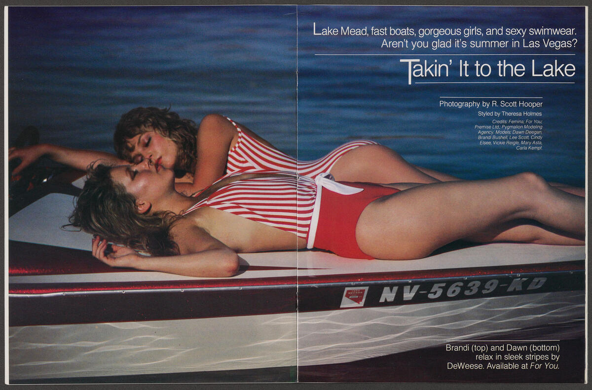 two women in swimsuits on boat on lake mead