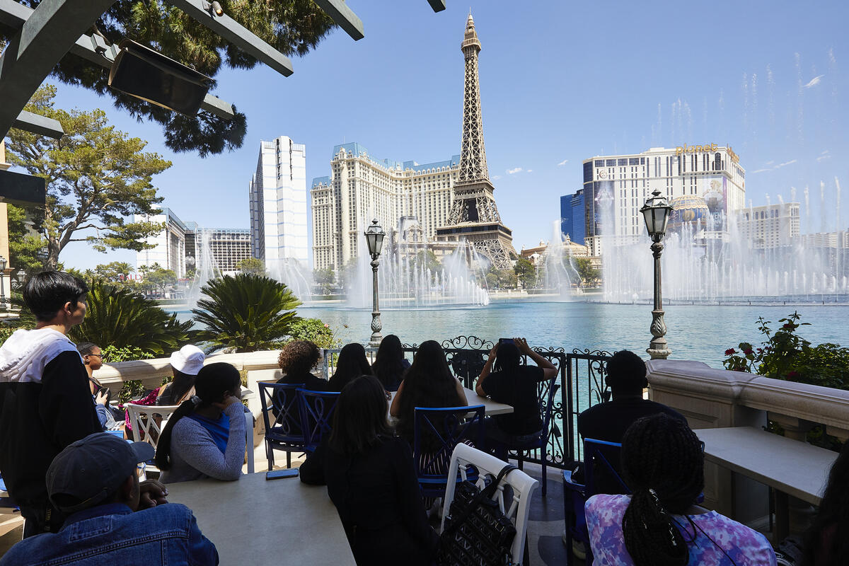 Students taking photos of the Bellagio fountain show