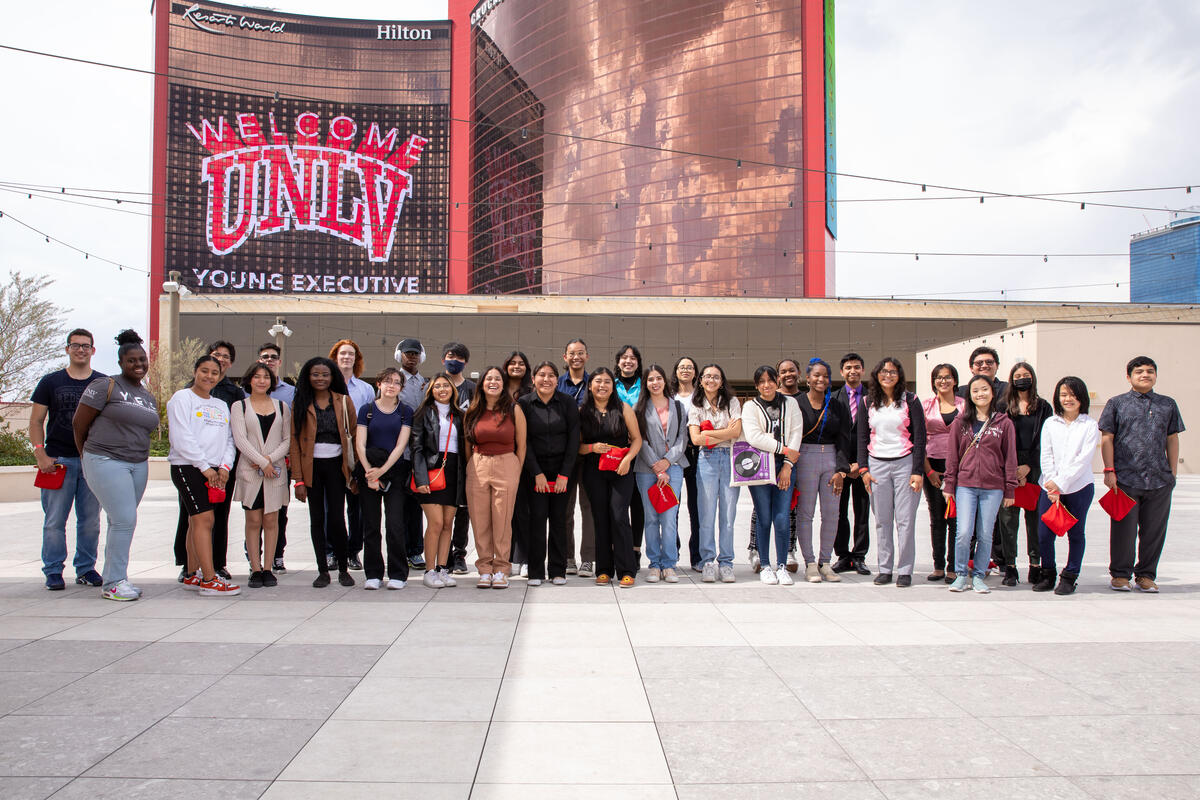 Students taking a group photo in front of Resorts World