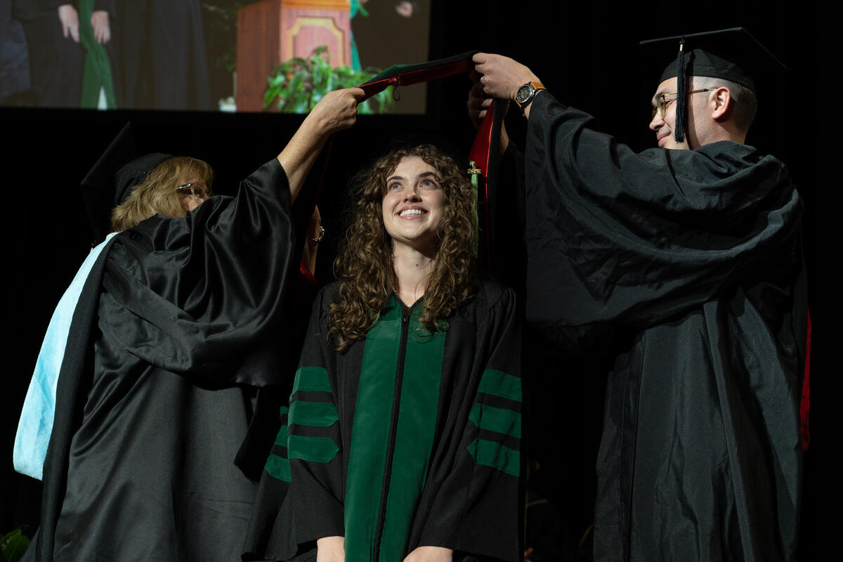 Kirk Kerkorian School of Medicine at UNLV Class of 2026 student being hooded at the commencement and academic hooding ceremony