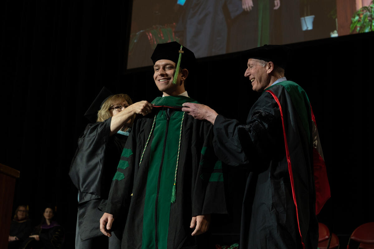 Kirk Kerkorian School of Medicine at UNLV Class of 2026 student being hooded at the commencement and academic hooding ceremony