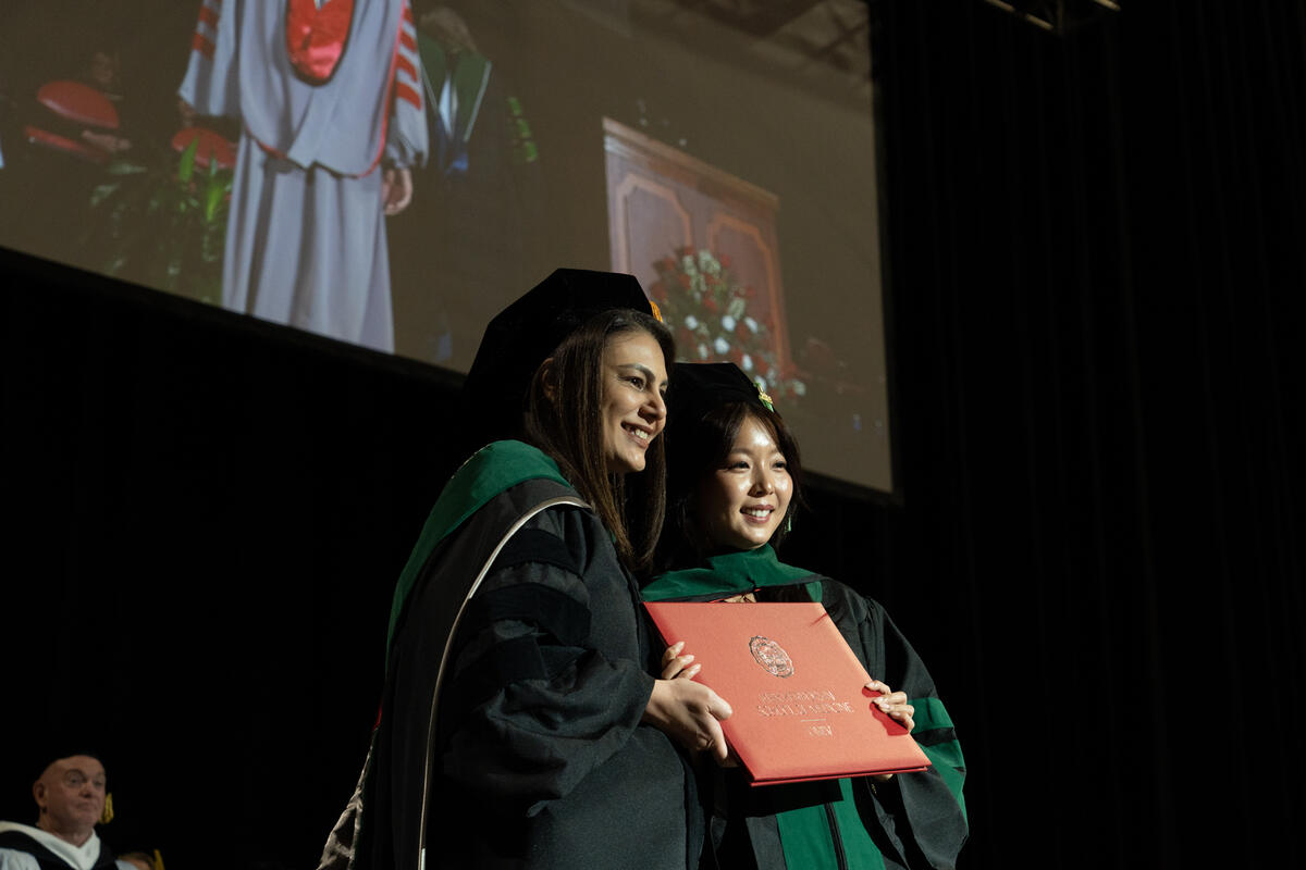 Kirk Kerkorian School of Medicine at UNLV Class of 2026 student posing for a photo at the commencement and academic hooding ceremony