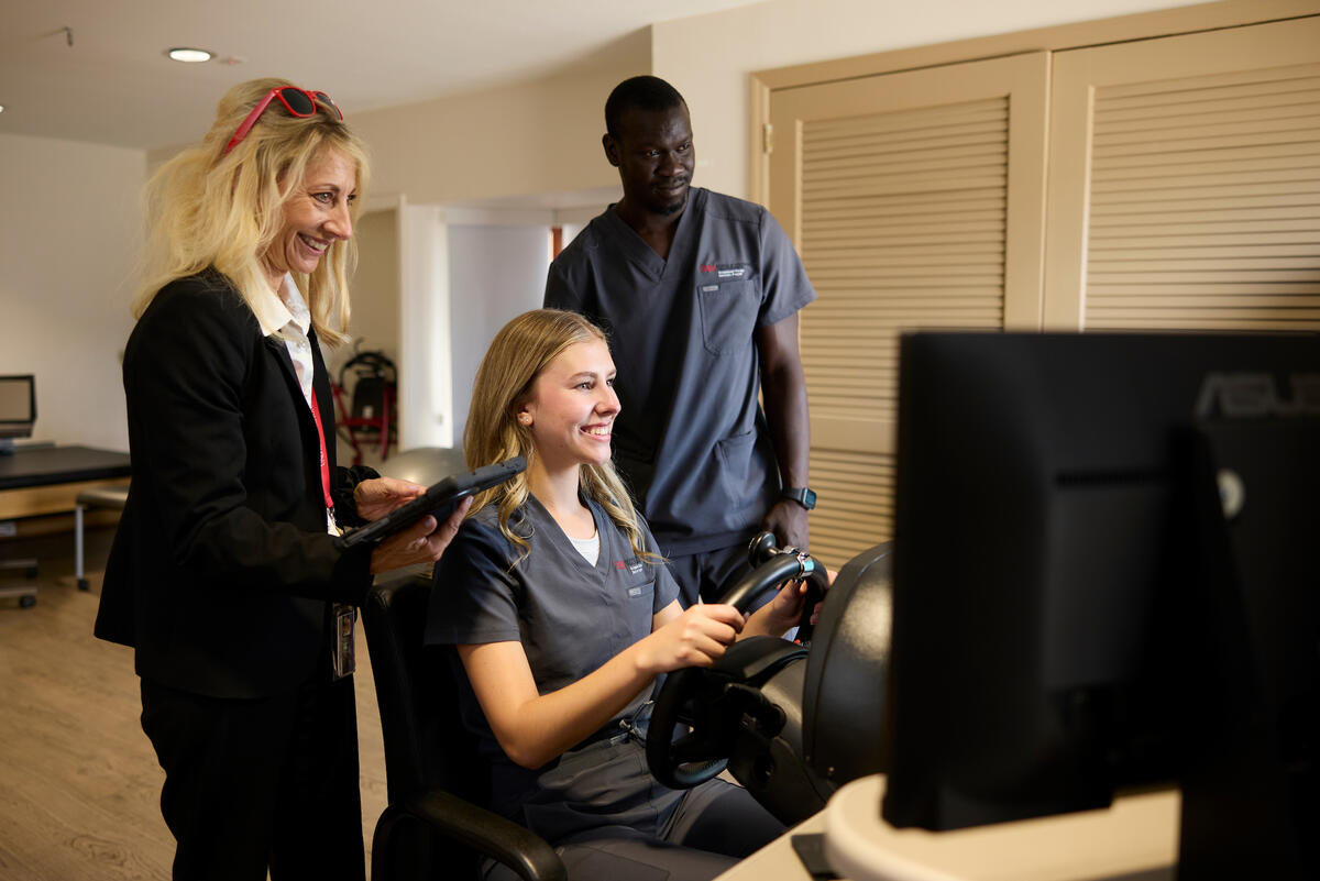 Occupational therapy students demonstrating a safe driving exercise