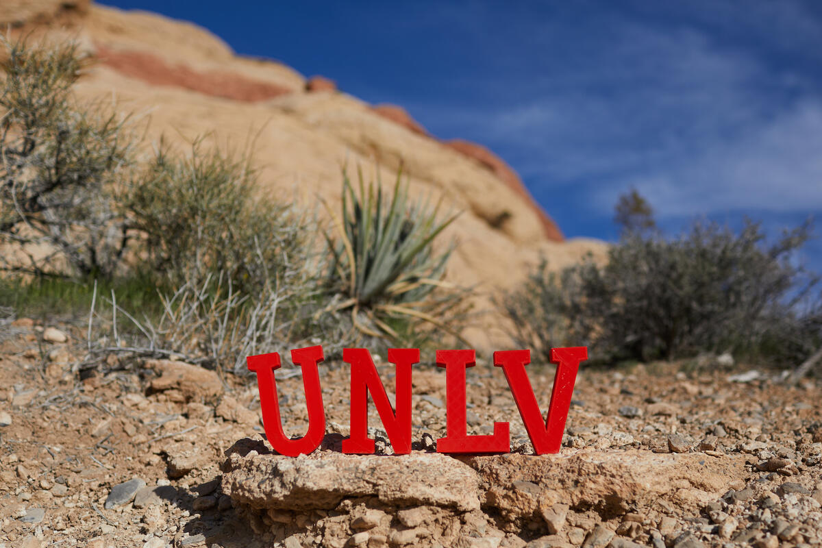 UNLV letters placed in front of rocky landscape at Red Rock state park