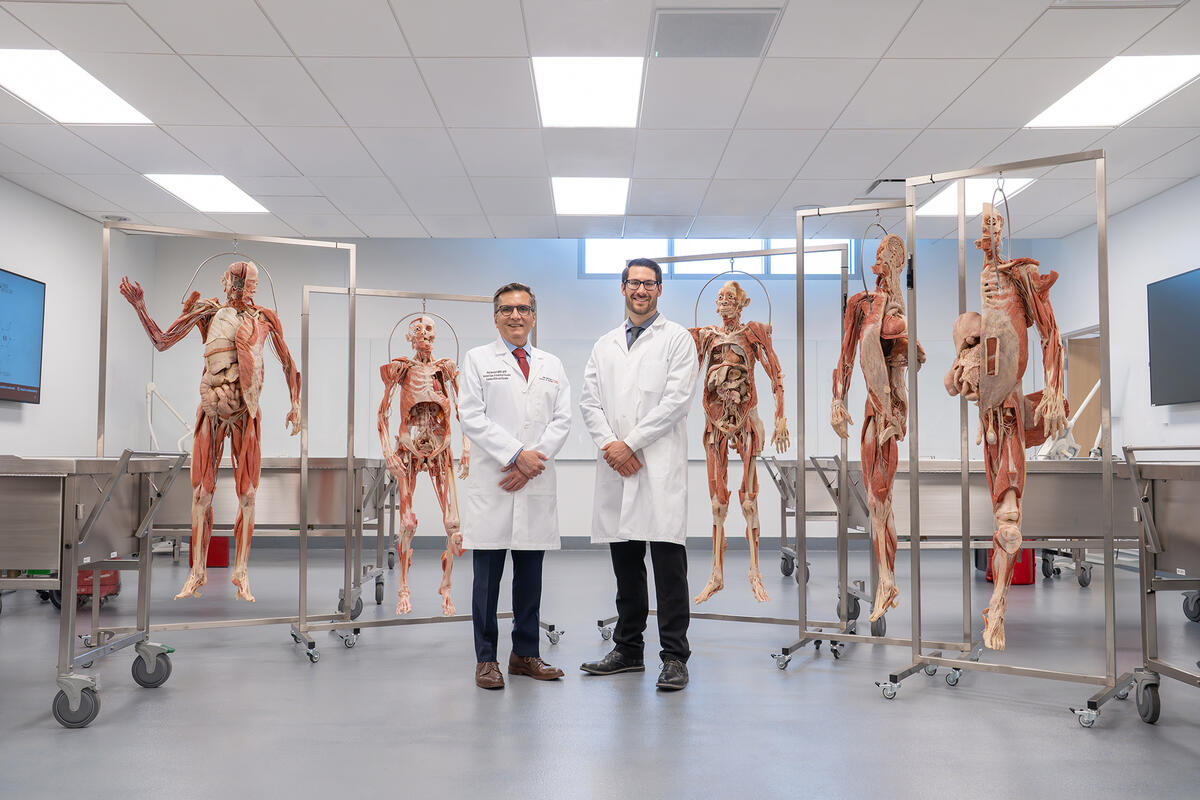 Dr. Aftab Merchant and Owen McCloskey in the school of medicine's prosection lab.