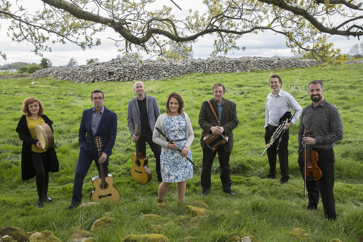 Irish Ensemble Danú outside on green hill