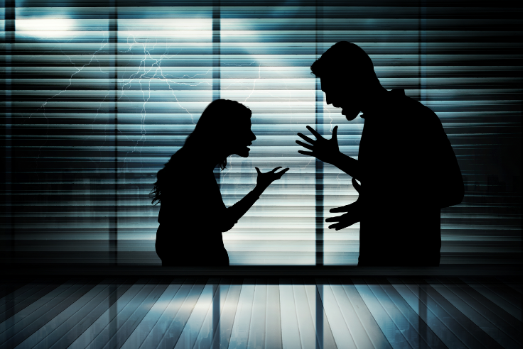 silhouette of man and woman arguing