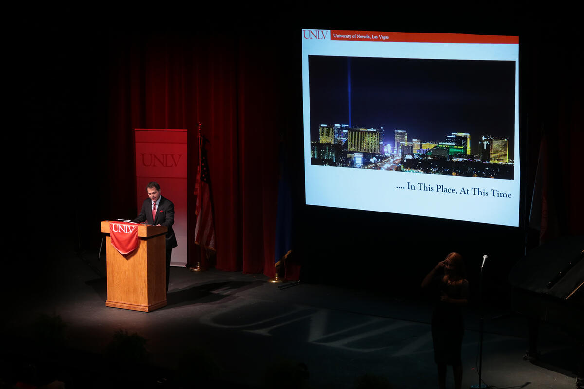 Len Jessup speaks at a podium