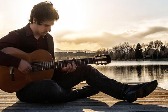 Mak Grgic playing guitar