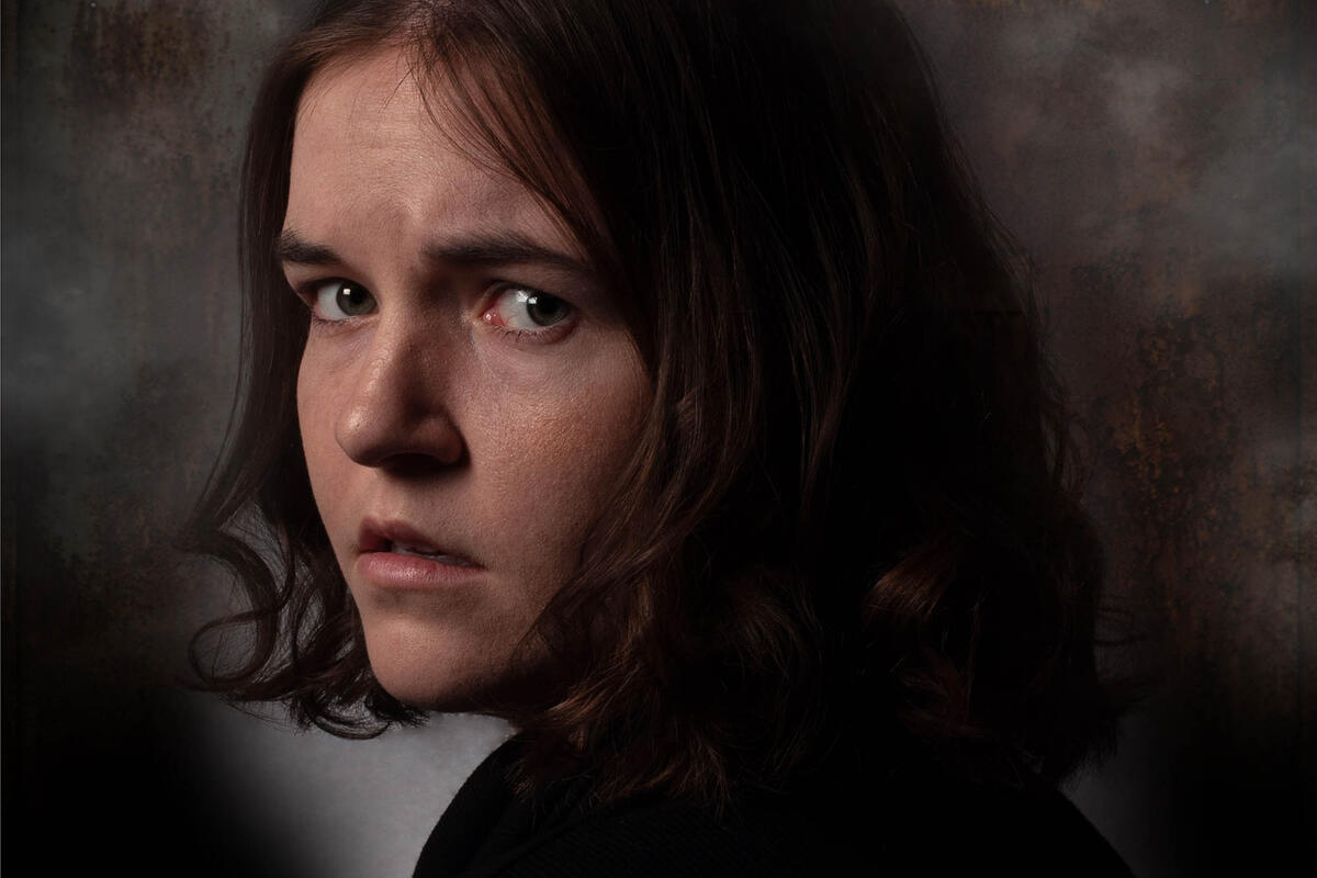 woman looking over shoulder