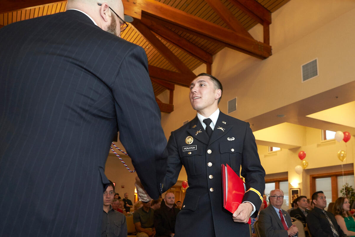 Rebel vet shaking hands