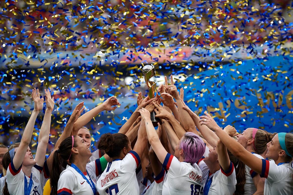 U.S. Women's National Soccer Team lifts FIFA World Cup 2019 trophy as confetti and streamers rain down