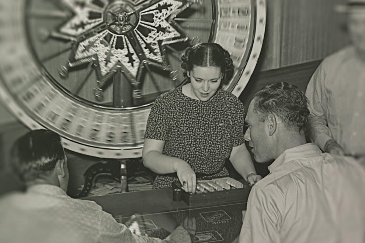 An unidentified woman works the wheel at the Hotel Apache and Casino in downtown Las Vegas, circa 1940.