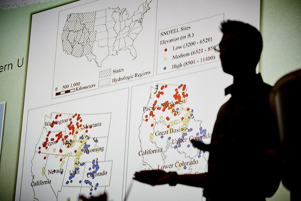 A silhouette of a man showing a diagram of data for western United States.