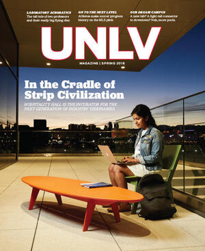 magazine cover with woman studying on balcony at sunset