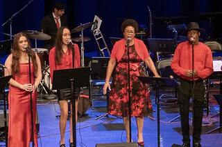 Jazz vocalists perform.
