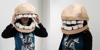 High resolution photo of performance art with people wearing masks