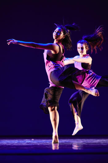 Two dancers perform