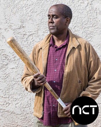 actor with baseball bat