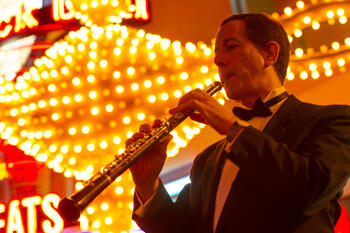 High resolution photo of Stephen Caplan playing his oboe