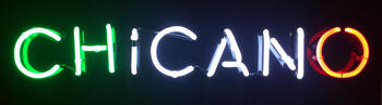 neon letters spelling Chicano. (courtesy of Ed Fuentes)