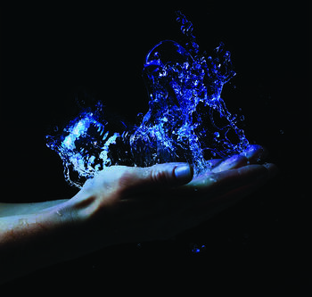 water splahes on an open hand