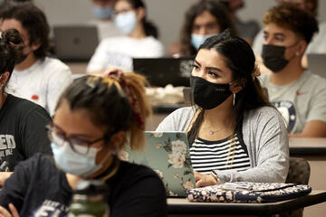Masked students in class