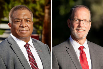 portraits of two men in suits